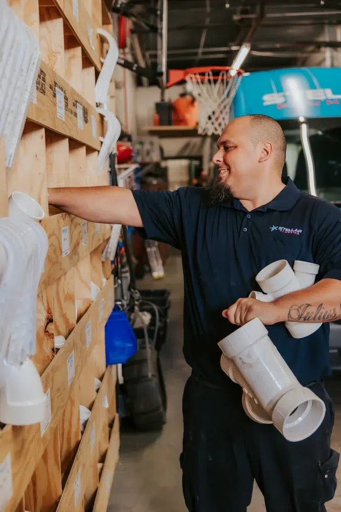 stellar plumber collecting items to handle a plumbing emergency in Arlington Heights, IL