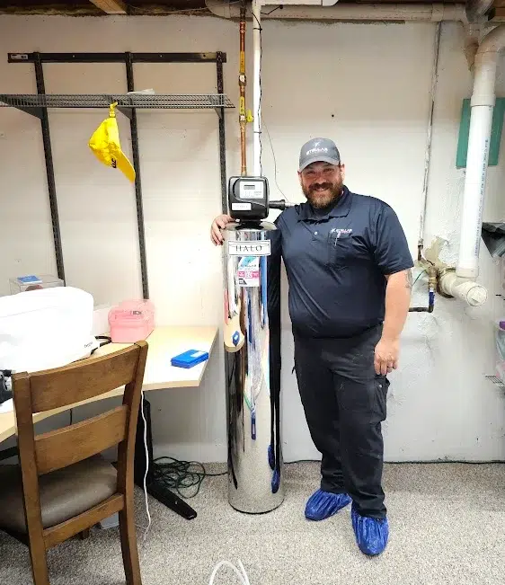 Technician with newly installed Halo filtration system in Elk Grove, IL.