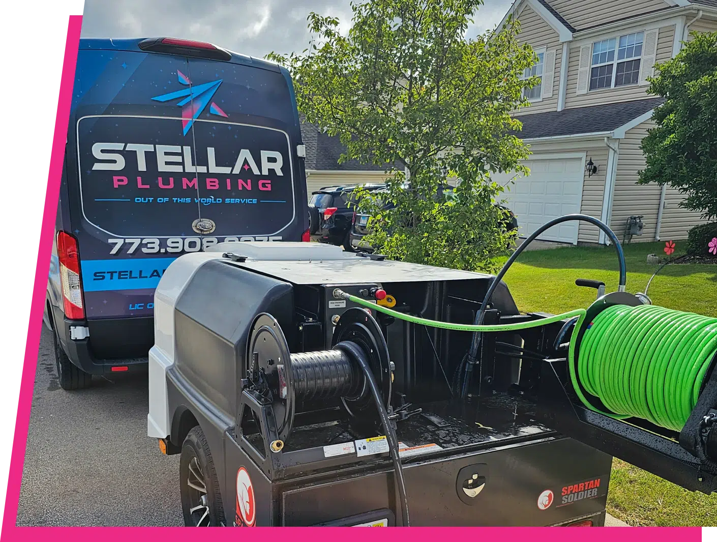 Stellar Plumbing truck and trailer outside of residential home