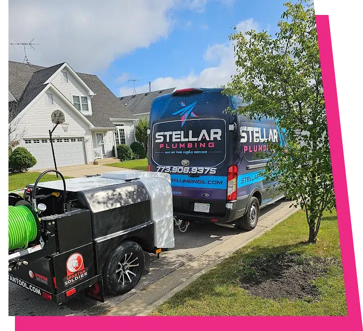 Stellar Plumbing van and hydrojetting trailer set up outside a home for sewer cleaning in Elk Grove Village, IL