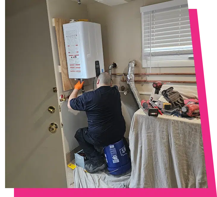 Stellar Plumbing technician installing a tankless water heater on a utility room wall in Arlington Heights, IL