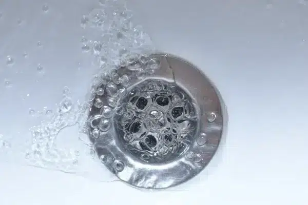 Water flowing into shower drain in residential home in Elk Grove.